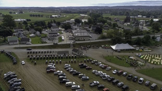 Aerial View of an Amish Fall Mud Sale as seen by a Drone on a Cloudy Day