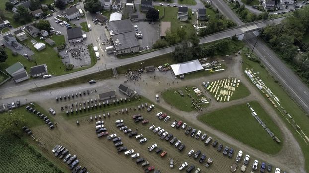 Aerial View of an Amish Fall Mud Sale as seen by a Drone on a Cloudy Day