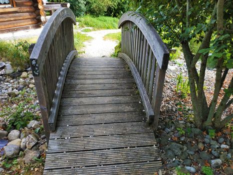 A wooden bridge shot in the garden on a sunny day