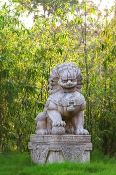 Buddhist sculpture. Chinese guardian lion statue in Gardens by the Bay, Singapoure.