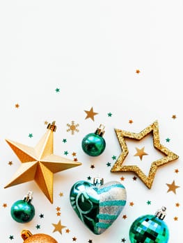 Christmas and New Year 2020 background with decorations, shaped as a circle. Golden and blue balls, stars, confetti and heart.