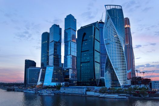 Moscow-city business center, Moscow, Russia. Big office complex near Moscow-river at sunset.