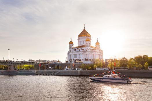 View of Cathedral of Christ the Saviour and Patriarshiy bringe at sunset. Moscow, Russia.