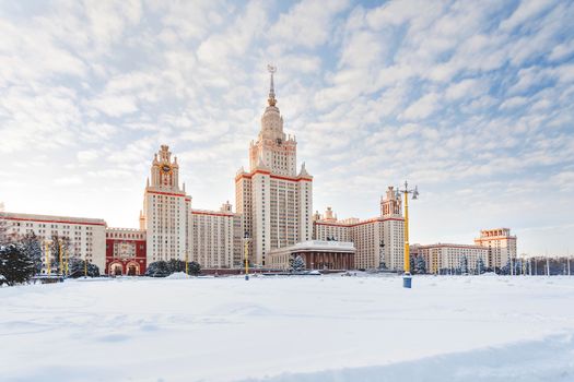 The main building of Moscow State University (MGU) in sunny winter day. Vorobevy Gory, Moscow, Russia.