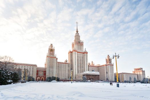 The main building of Moscow State University (MGU) in sunny winter day. The Sparrow Hills, Moscow, Russia.