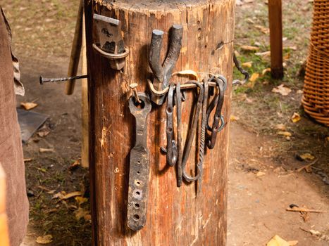 Medieval blacksmith tools. Annual festival Times and Epochs. Historical reconstruction. Moscow, Russia.