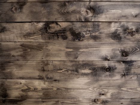 Wooden background of old table. Shabby texture of wooden boards.