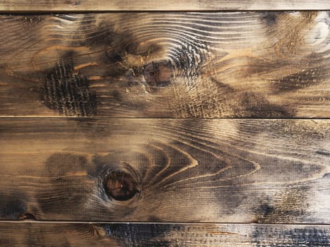 Wooden background of old table. Shabby texture of wooden boards.