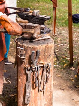 Medieval blacksmith tools. Annual festival Times and Epochs. Historical reconstruction. Moscow, Russia.