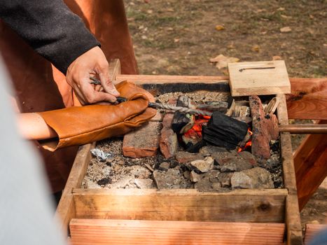 Medieval blacksmith tools. Annual festival Times and Epochs. Historical reconstruction. Moscow, Russia.