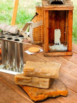 Old fashioned household items in markitant tent, set for candle and soap making. Historical reconstruction of 19th century. Festival Times and Epochs. Moscow, Russia.