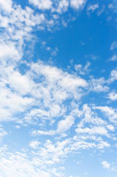 Bright sunny day with clouds. Cloudscape on blue sky. Soft focus.