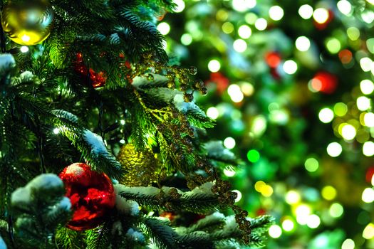 Outdoor decorations for New Year and Christmas celebration. Streets of Moscow decorated with light bulbs and colorful shiny balls. Russia.
