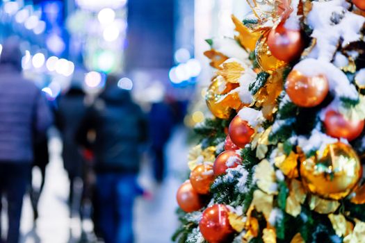 Outdoor decorations for New Year and Christmas celebration. Streets of Moscow decorated with light bulbs and colorful shiny balls. Russia.