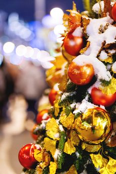 Outdoor decorations for New Year and Christmas celebration. Streets of Moscow decorated with light bulbs and colorful shiny balls. Russia.