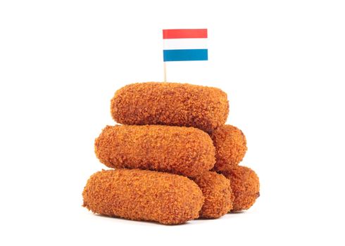 Brown crusty dutch kroketten with dutch flag, isolated on a white background