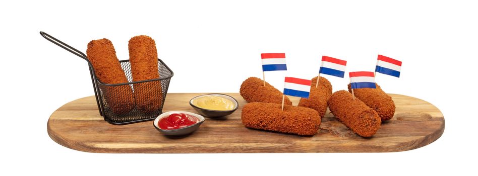 Brown crusty dutch kroketten on a serving tray isolated on a white background