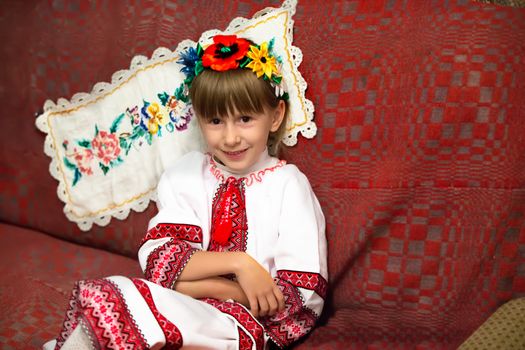 Belarus, Gomel region, Mihalki village, September 23, 2017. Reconstruction of the ancient ceremony of the wedding of the fireplace.Belarusian little girl in national clothes in towels