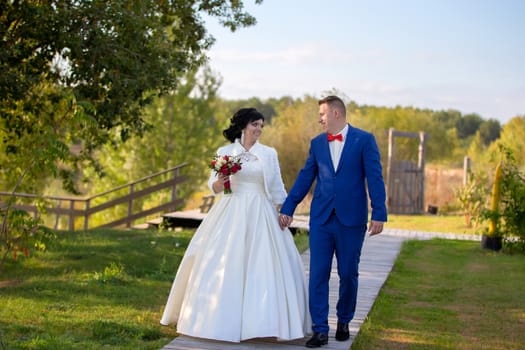 .Bride and groom on a wedding walk,