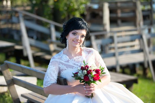 Portrait of a bride with a bouquet. Bride on wedding day