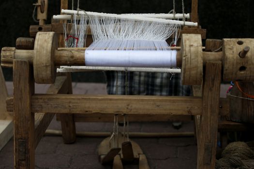 Ancient spinning machine.An ancient way to fabricate.Loom