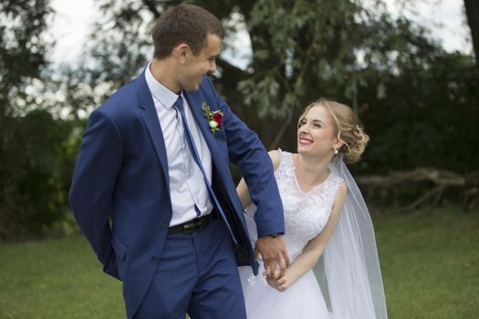 Walk of the bride and groom.Bride and groom. Wedding day