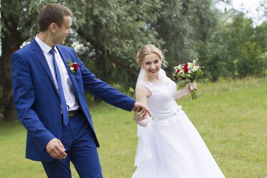 Walk of the bride and groom.Bride and groom. Wedding day