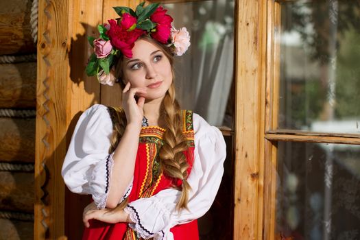 Beautiful woman portrait in russian style. Beautiful Russian girl in traditional dress. Russian style.