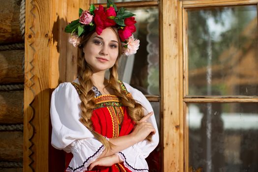 Beautiful woman portrait in russian style. Beautiful Russian girl in traditional dress. Russian style.