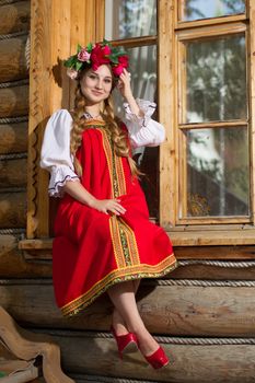 Beautiful woman portrait in russian style. Beautiful Russian girl in traditional dress. Russian style.