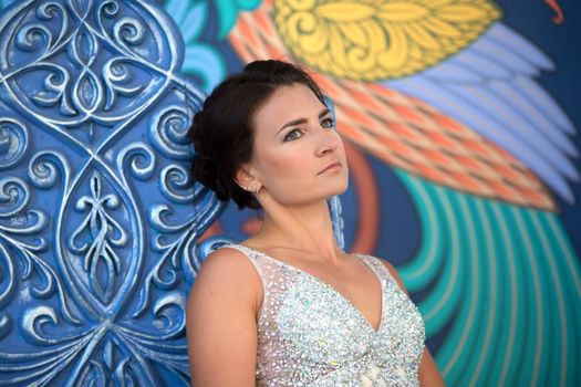 Russia, Moscow, Izmaylovsky Park, August 27, 2017. International Photo Festival.Beautiful sad woman with an astute look. Serious woman.