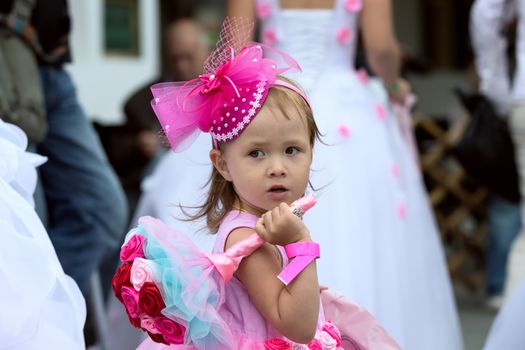 Little girl with a wedding bouquet