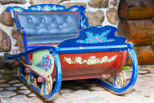 Ancient painted sledges. Retro sleigh