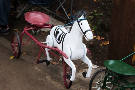 Retro bicycle. An old children's bicycle. Old Horse Bike