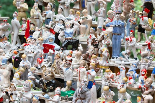 Russia, Moscow, Izmaylovsky Park, August 27, 2017. International Photo Festival.Earthenware figurines. Ancient faience figurines. Russian faience