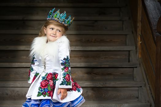 Russia, Moscow, Izmaylovsky Park, August 27, 2017. International Photo Festival.A little Russian queen. The girl in the crown. Queen.