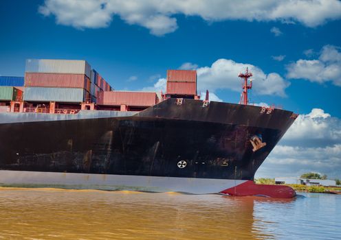 Massive Black Freighter sailing into Savannah River