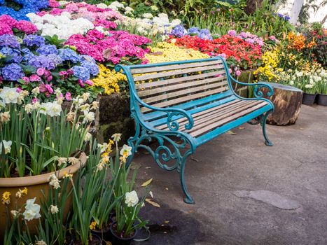 table and chairs standing on a lawn at the garden