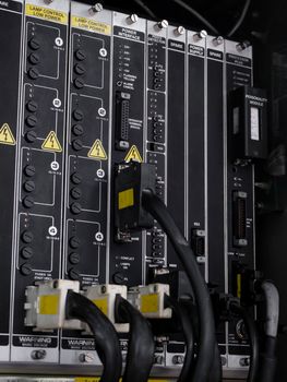 Electrical panel at a assembly line factory. Controls and switches.