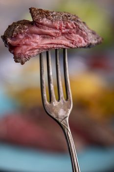 slice of steak on a fork