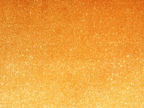Golden fabric background with light reflections.Soft focused luxury holiday background.