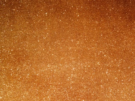 Golden fabric background with light reflections. Perfect luxury holiday background.