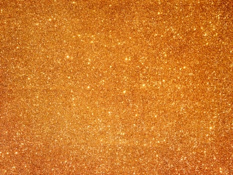 Golden fabric background with light reflections. Perfect luxury holiday background.