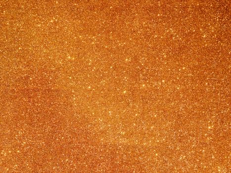 Golden fabric background with light reflections. Perfect luxury holiday background.