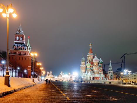 Famous landmarks - St. Basil Cathedral on Red square in Kremlin. Winter evening in Moscow, Russia.