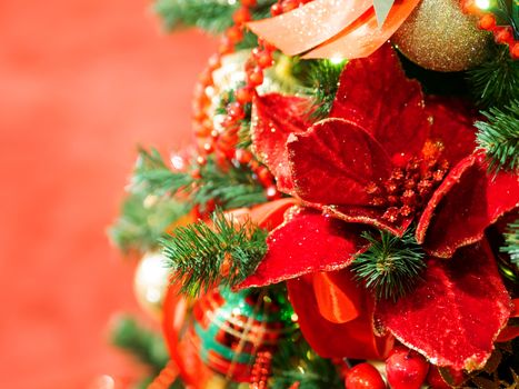 Elegant flower, made of fabric with sequins. New Year decoration for Christmas tree.