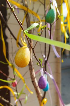 Street festival "Moscow Spring" in historical center of Moscow city, Russia. Flower decoration of colorful easter fair.