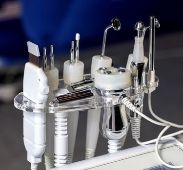 Close-up of various tools of medical cosmetology apparatus for liposuction and massage, used for the correction of the human body. Machine cosmetology.