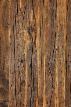 Old, cracked brown wooden background and texture, high resolution, vertical image.