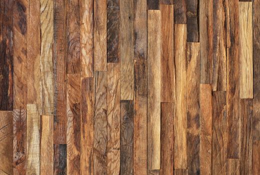 Mosaic of old wooden slats, wooden planks. Brown slats, planch, bred wall. Vintage rustic close-up wood texture.